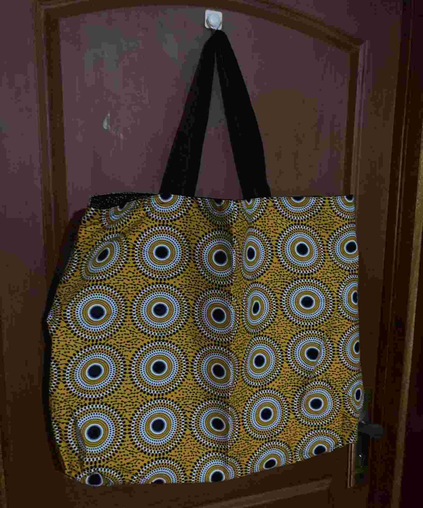 Borsa Ami crossbody bag marrone con dettaglio intrecciato frontale e tracolla regolabile